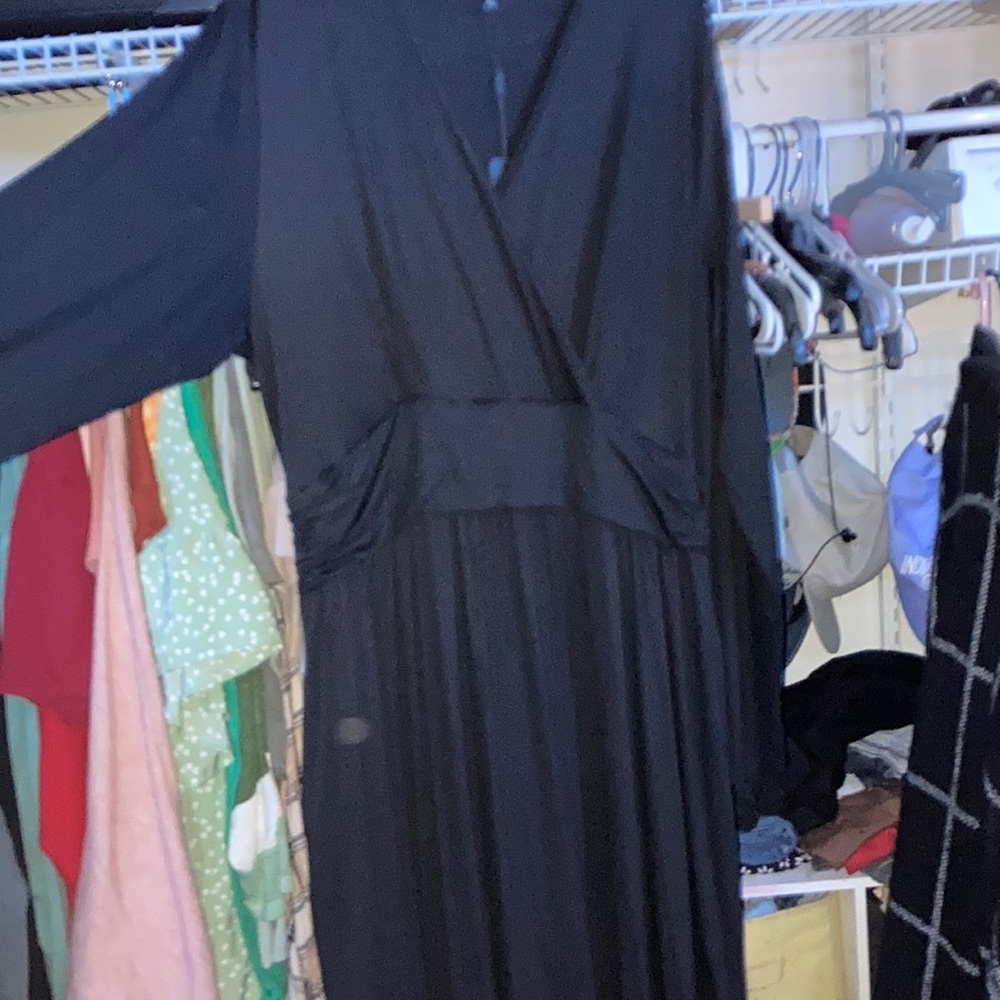 Black long sleeve, long dress. Never been worn and still has tags!